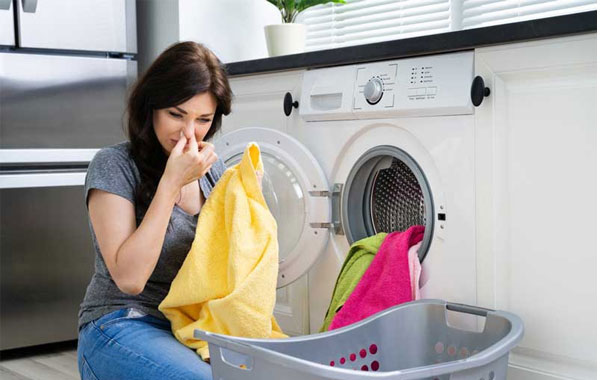 علت بوی بد لباسشویی